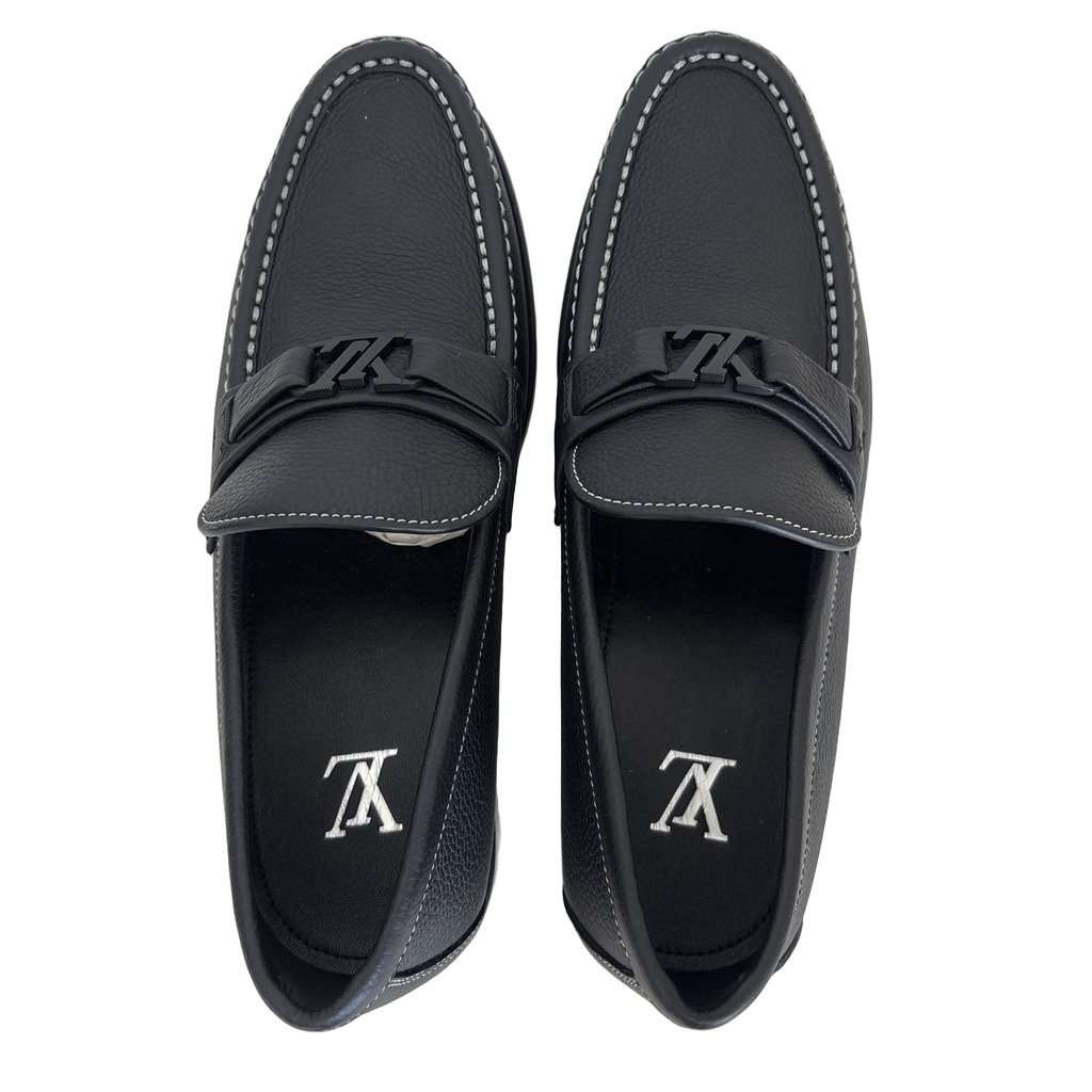 Louis Vuitton Brand New, Never Worn. Black Leather Never worn, with tag - Front View