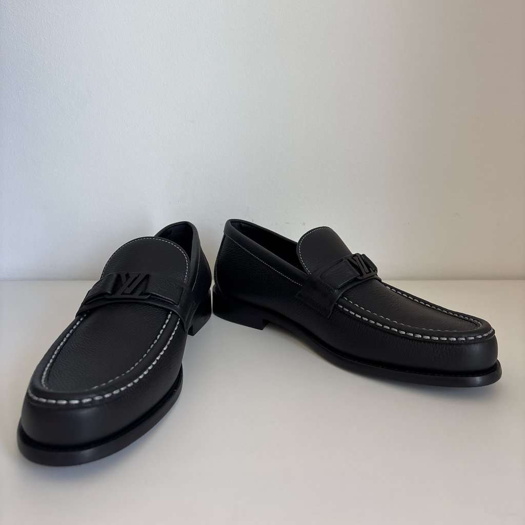 Louis Vuitton Brand New, Never Worn. Black Leather Never worn, with tag - Model View