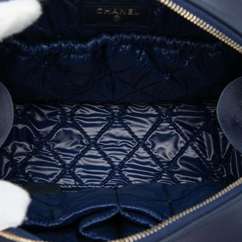 Chanel Large Quilted Caviar Curvy Cosmetic Pouch Blue Leather Very good - Model View