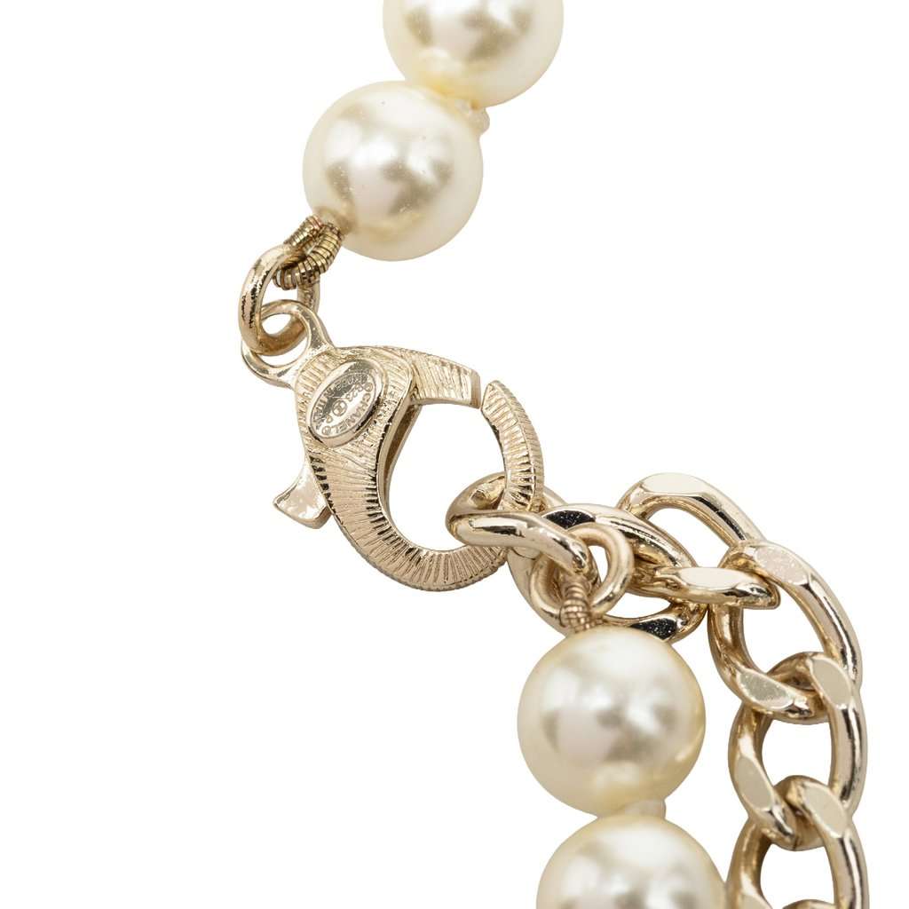 Chanel CC Brass No 5 Strass and Faux Pearl Pendant Necklace Gold Metal Very good - Model View