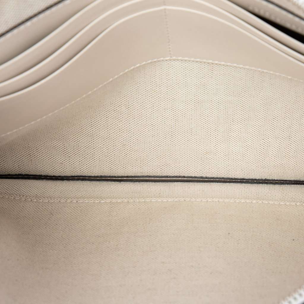 Gucci GG Embossed Perforated Calfskin Wristlet Clutch White Leather Very good - Model View