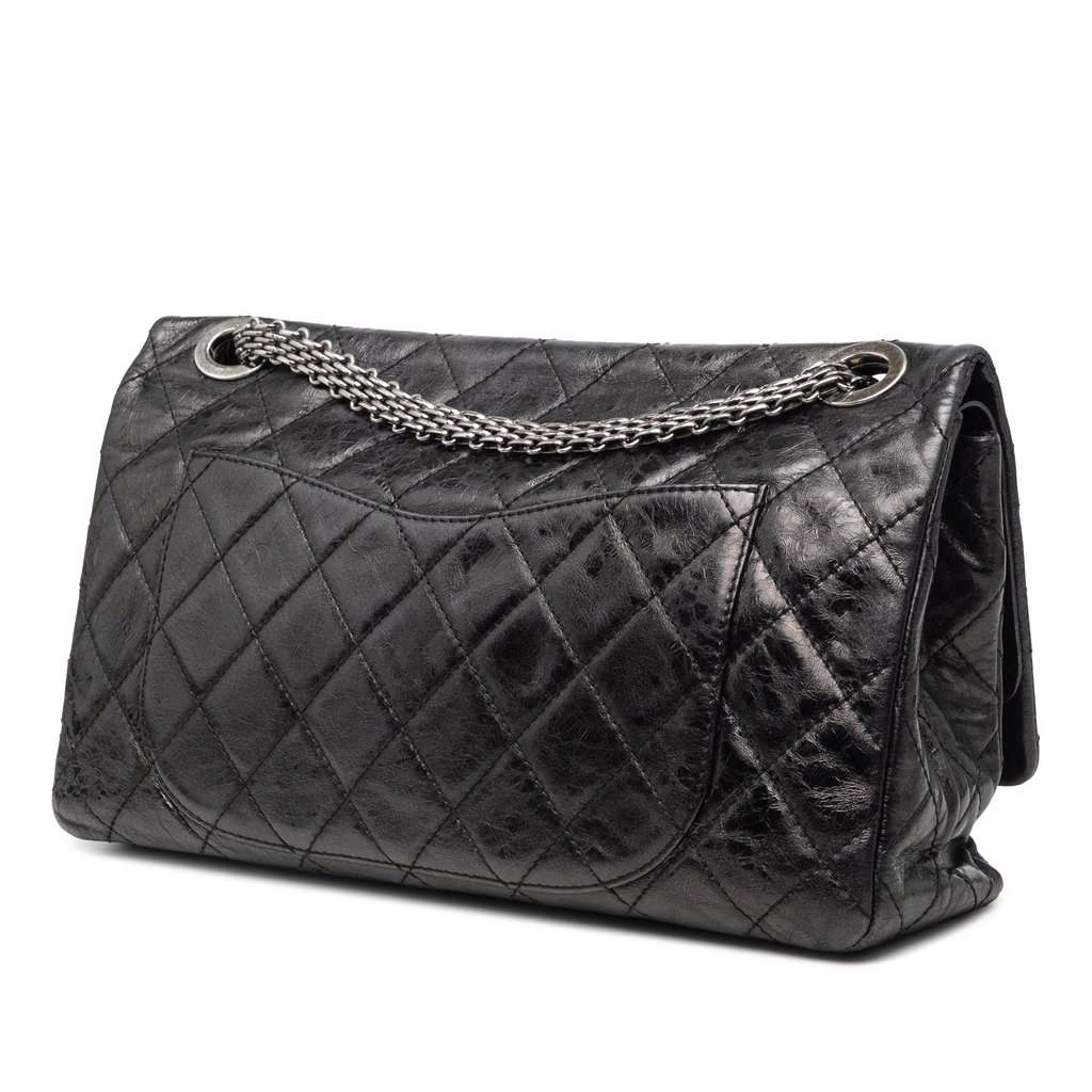 Chanel Quilted Aged Calfskin Reissue 2.55 Double Flap 228 Black Leather Very good condition - Back View