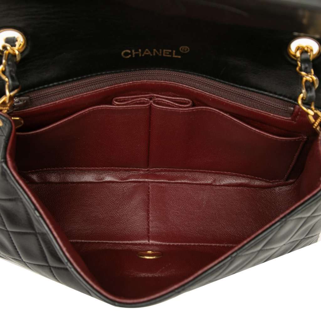 Chanel Medium Quilted Lambskin Full Flap Black Leather Very good condition - Model View