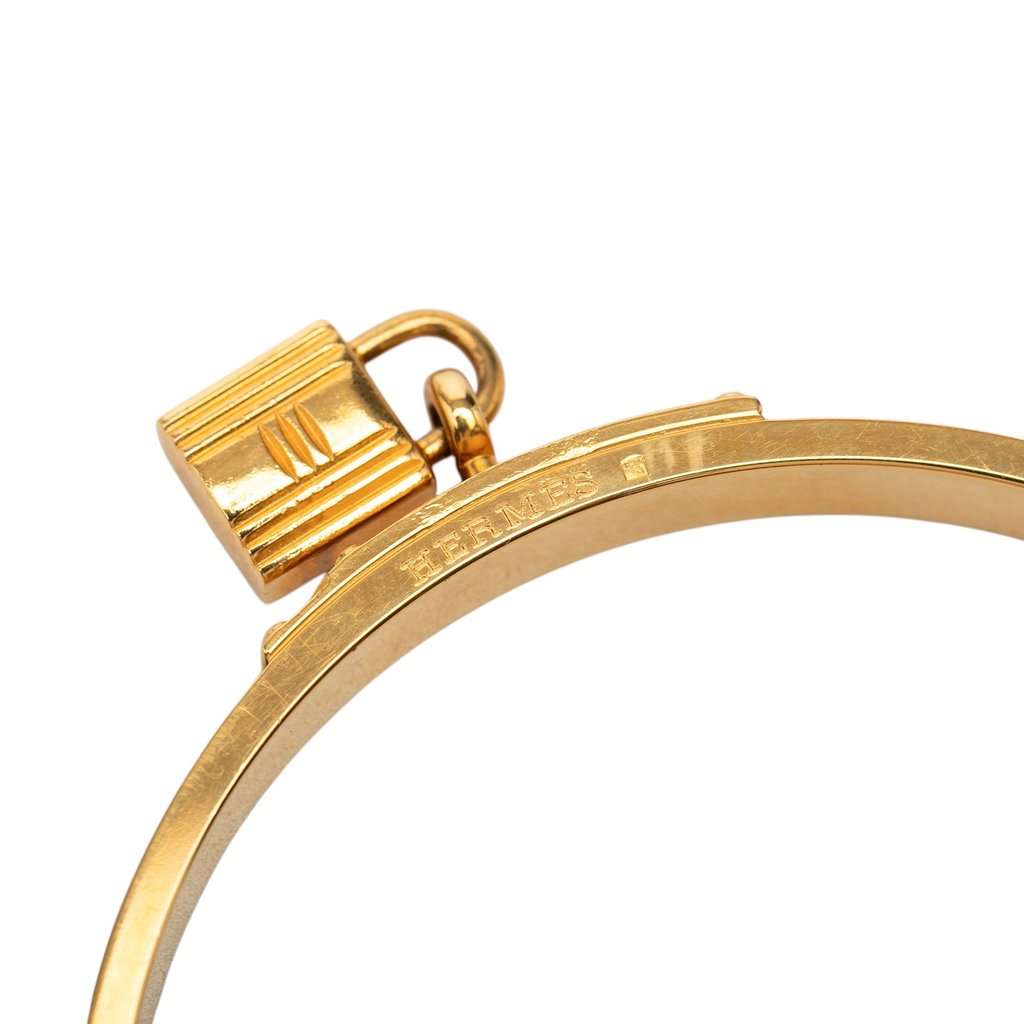 Hermès Gold Plated Epsom Kelly Cadena Lock Bangle Bracelet Gold Metal Very good condition - Model View