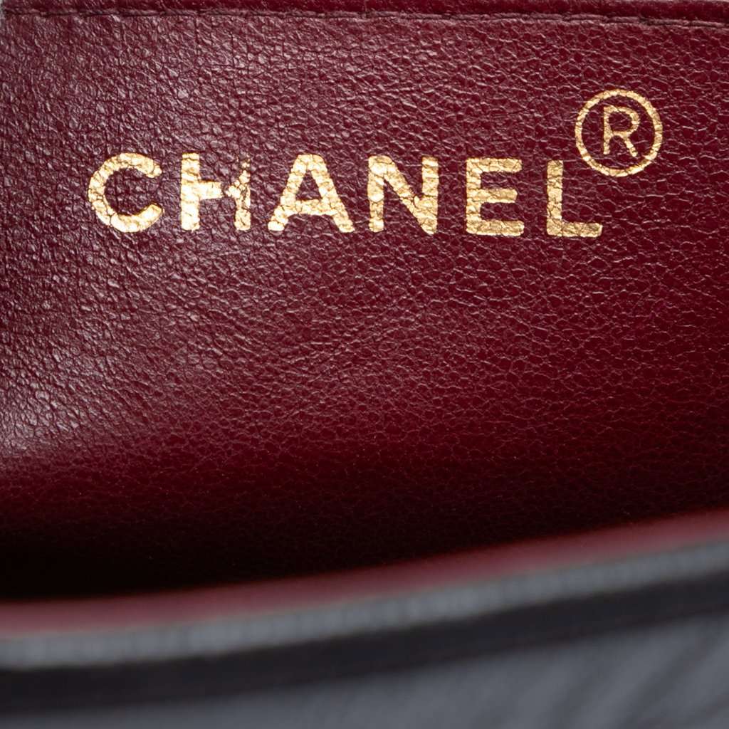 Chanel CC Vertical Quilt Lambskin Flap Black Leather Very good condition - Box View