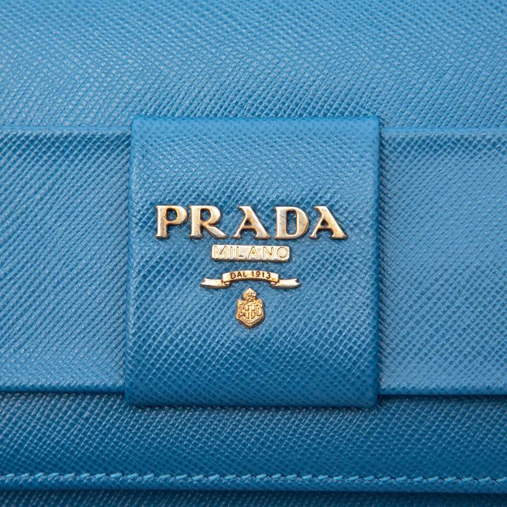 Prada Saffiano Lux Bow Wallet On Strap Blue Leather Very good condition - Box View