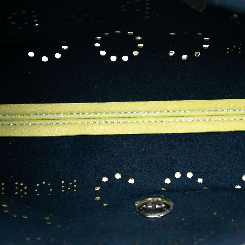 Chanel Perforated Calfskin Logo Eyelet Flap Yellow Leather Very good condition - Model View