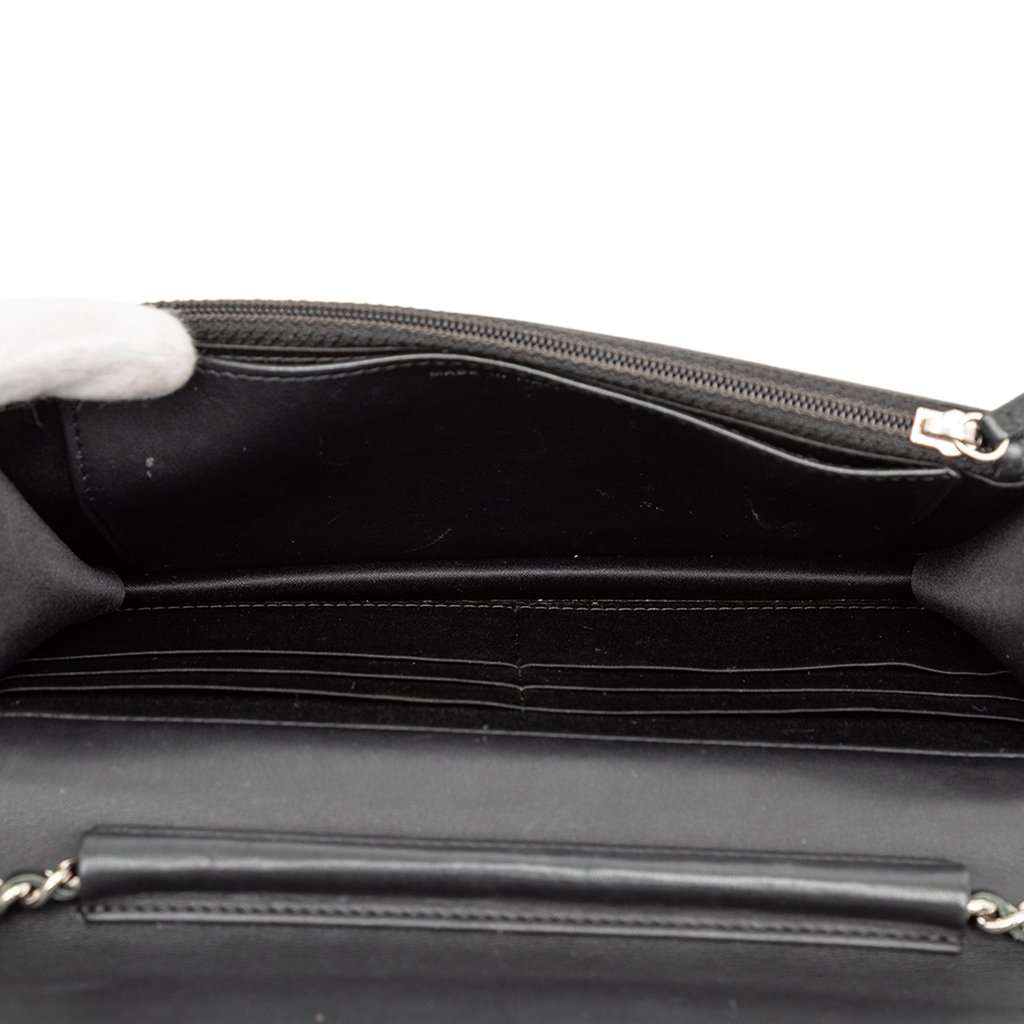 Chanel CC Embossed Patent Camellia Wallet On Chain Brown Leather Very good - Model View
