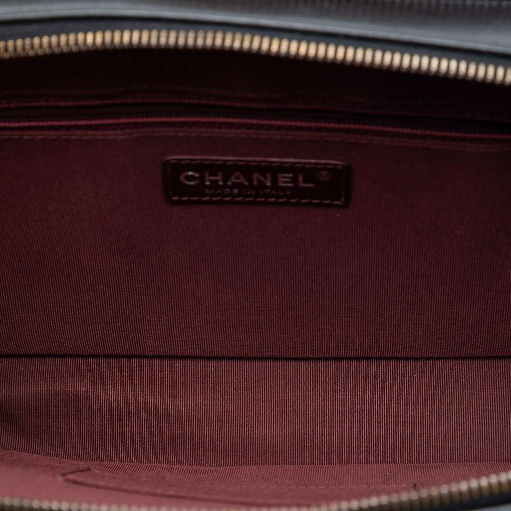Chanel Medium Quilted Lambskin Coco Boy Camera Bag Black Leather Very good - Model View