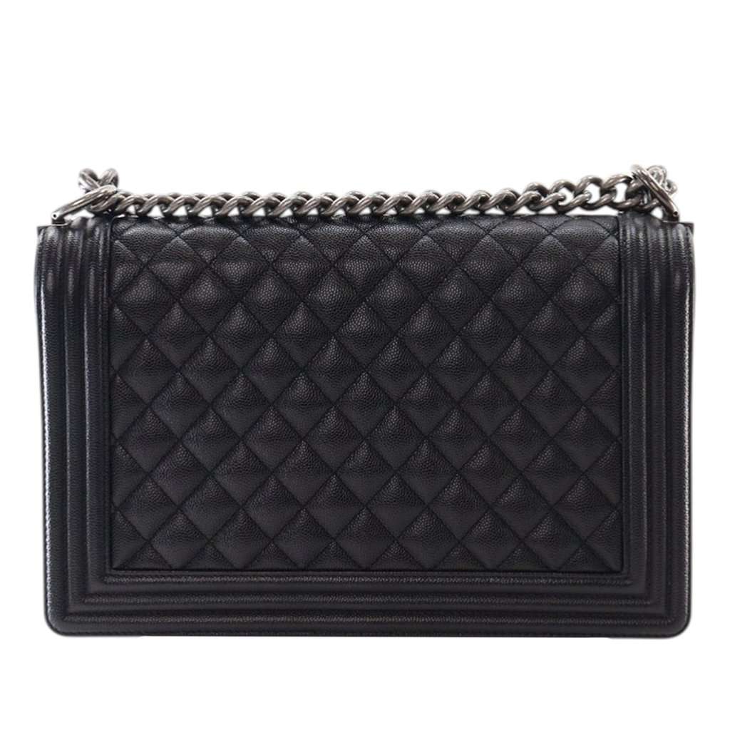 Chanel Medium Quilted Caviar Boy Flap Black Leather Very good condition - Model View