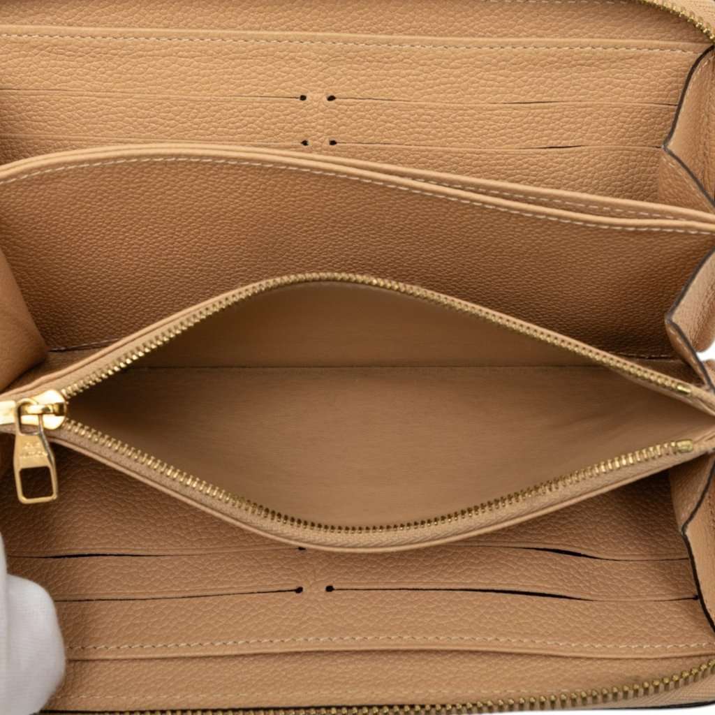 Louis Vuitton Monogram Empreinte Zippy Long Wallet Beige Leather Very good - Model View