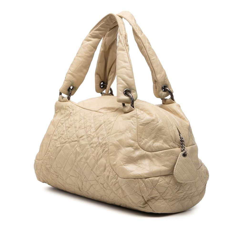 Chanel CC Quilted Aged Calfskin Coco Rider Bowling Bag Beige Leather Very good condition - Back View