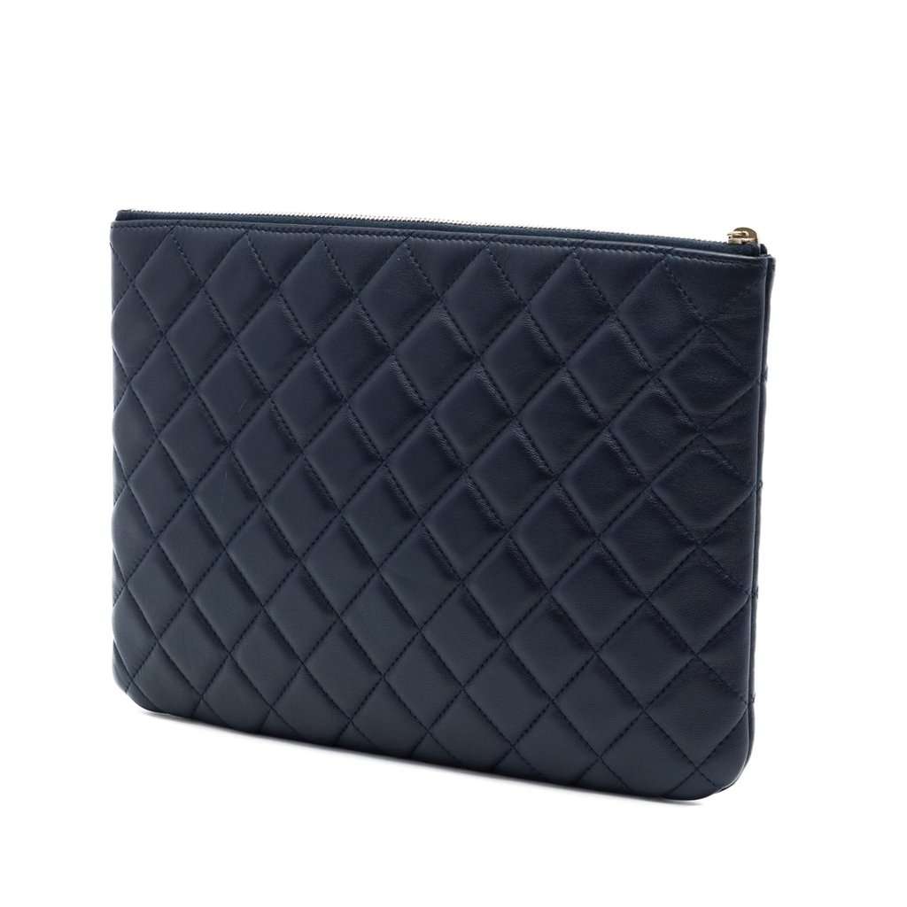 Chanel Medium Quilted Lambskin O Case Clutch Blue Leather Very good condition - Back View