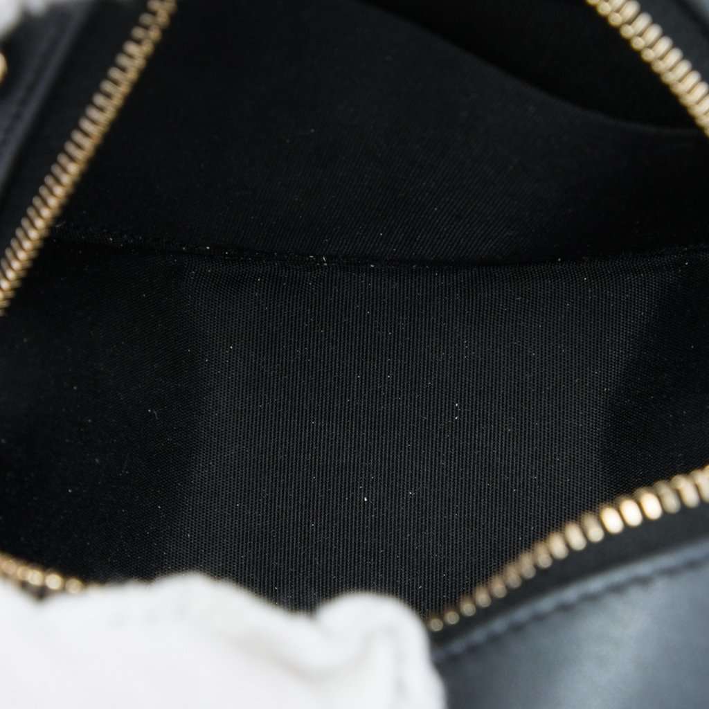 Chanel CC Quilted Iridescent Lambskin Pearl Round Clutch with Chain Black Leather Very good - Model View