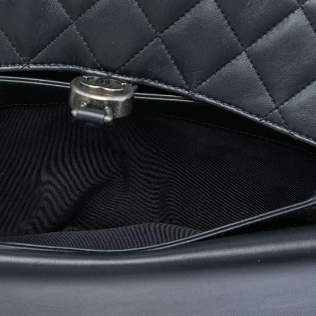 Chanel Quilted Lambskin CC Round Clasp Accordion Flap Black Leather Very good - Model View