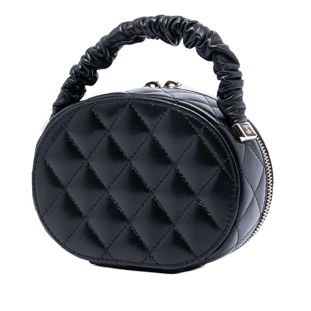 Chanel CC Quilted Lambskin Oval Top Handle Clutch Black Leather Very good condition - Back View