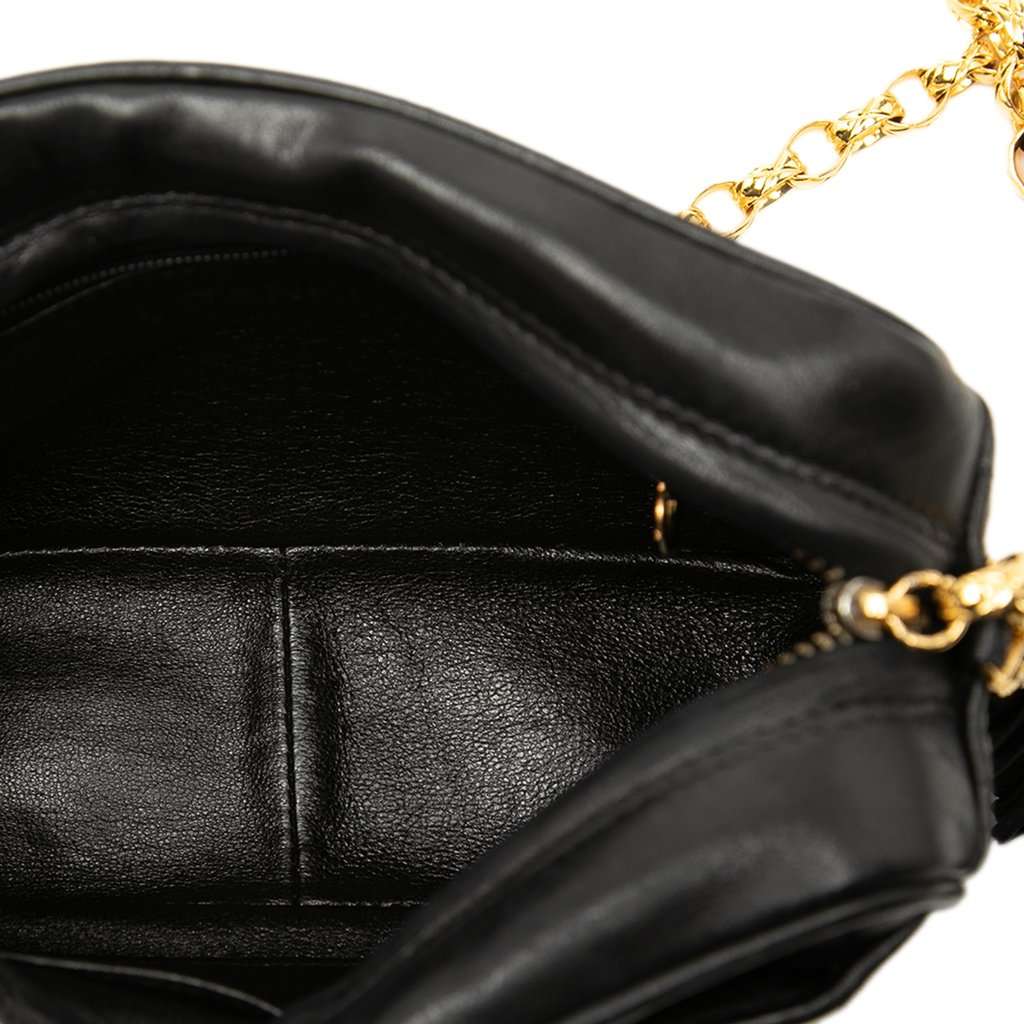 Chanel CC Vertical Quilted Lambskin Tassel Camera Bag Black Leather Very good condition - Model View