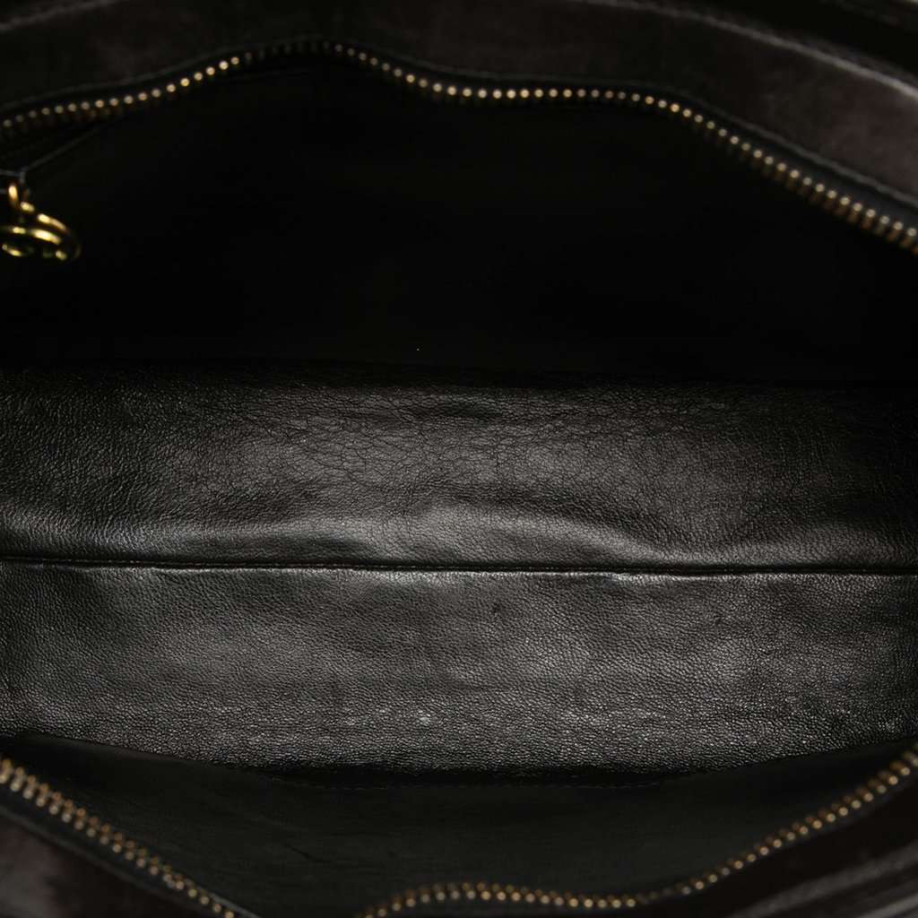 Chanel CC Vertical Quilt Lambskin Medallion Shoulder Bag Black Leather Very good condition - Model View
