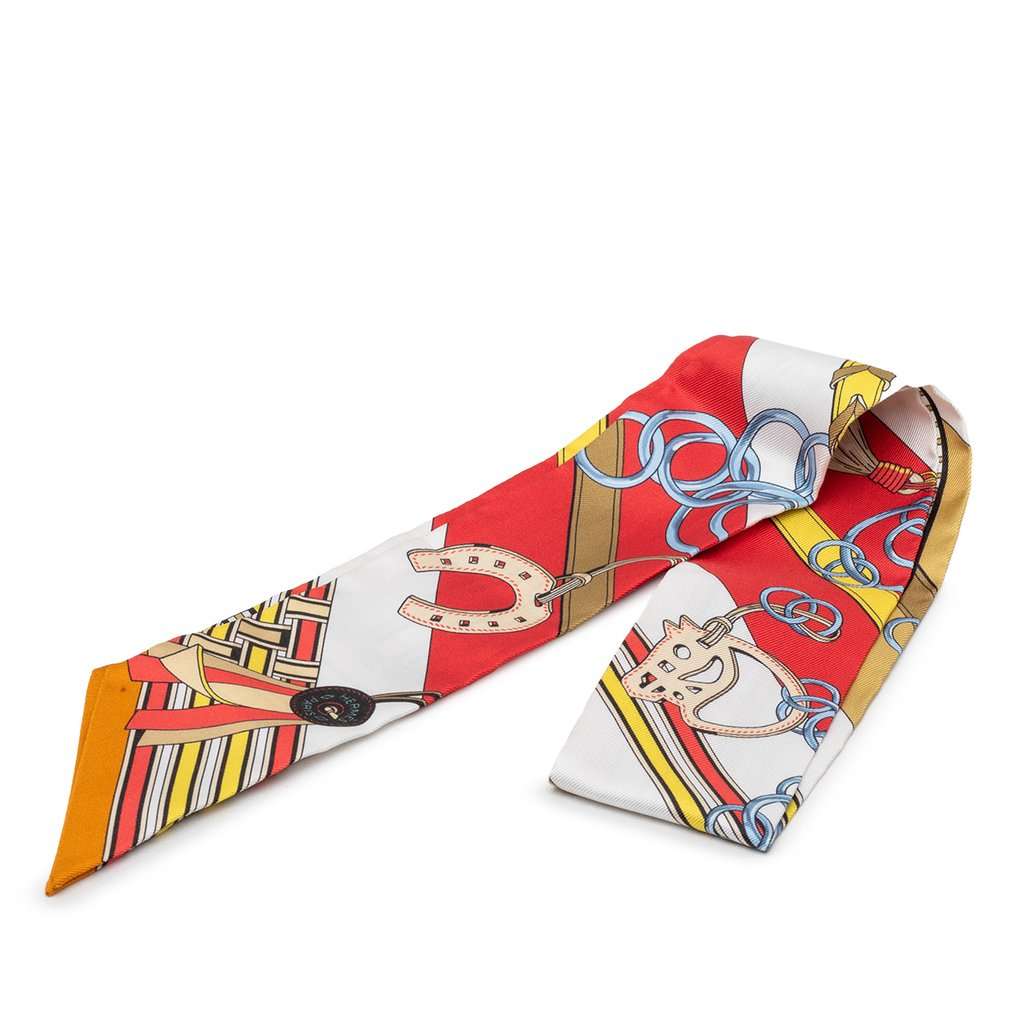 Hermès Brides et Gris-Gris Silk Twilly Scarf Red Very good condition - Front View
