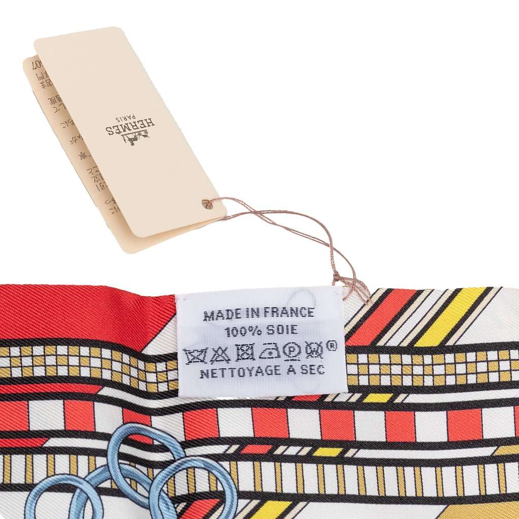 Hermès Brides et Gris-Gris Silk Twilly Scarf Red Very good condition - Model View