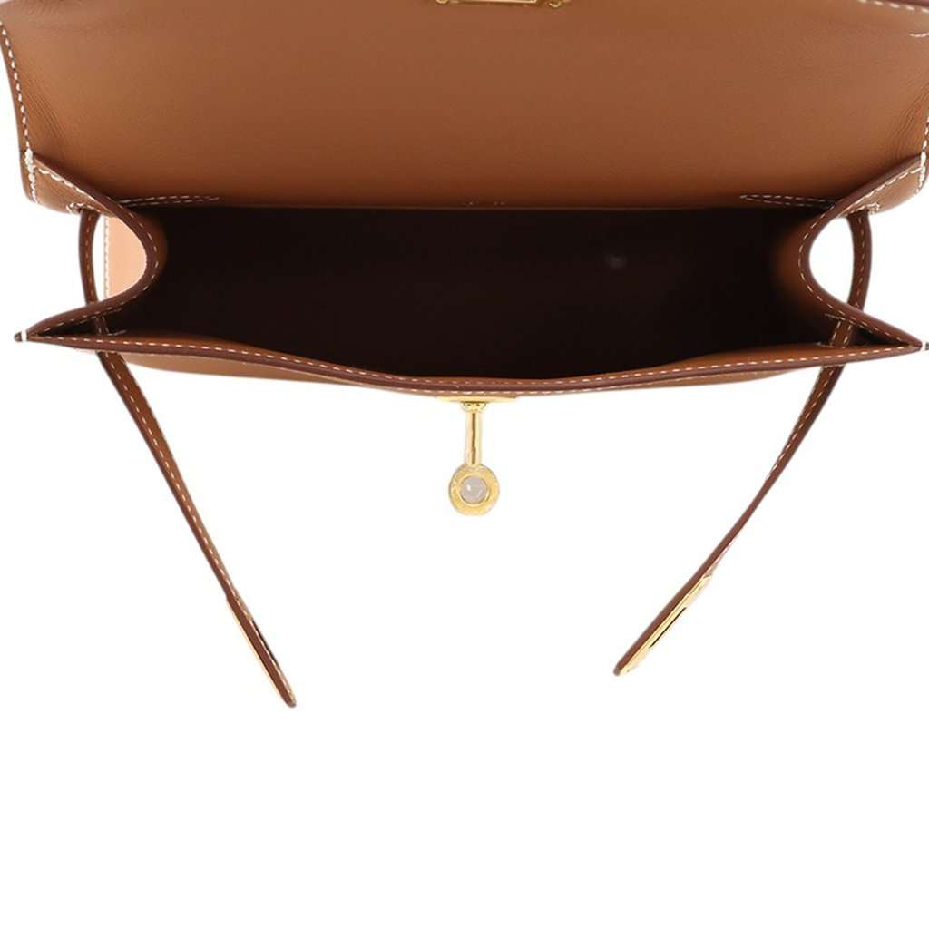 Hermès Swift Kelly Pochette 22 Brown Leather Never worn - Model View