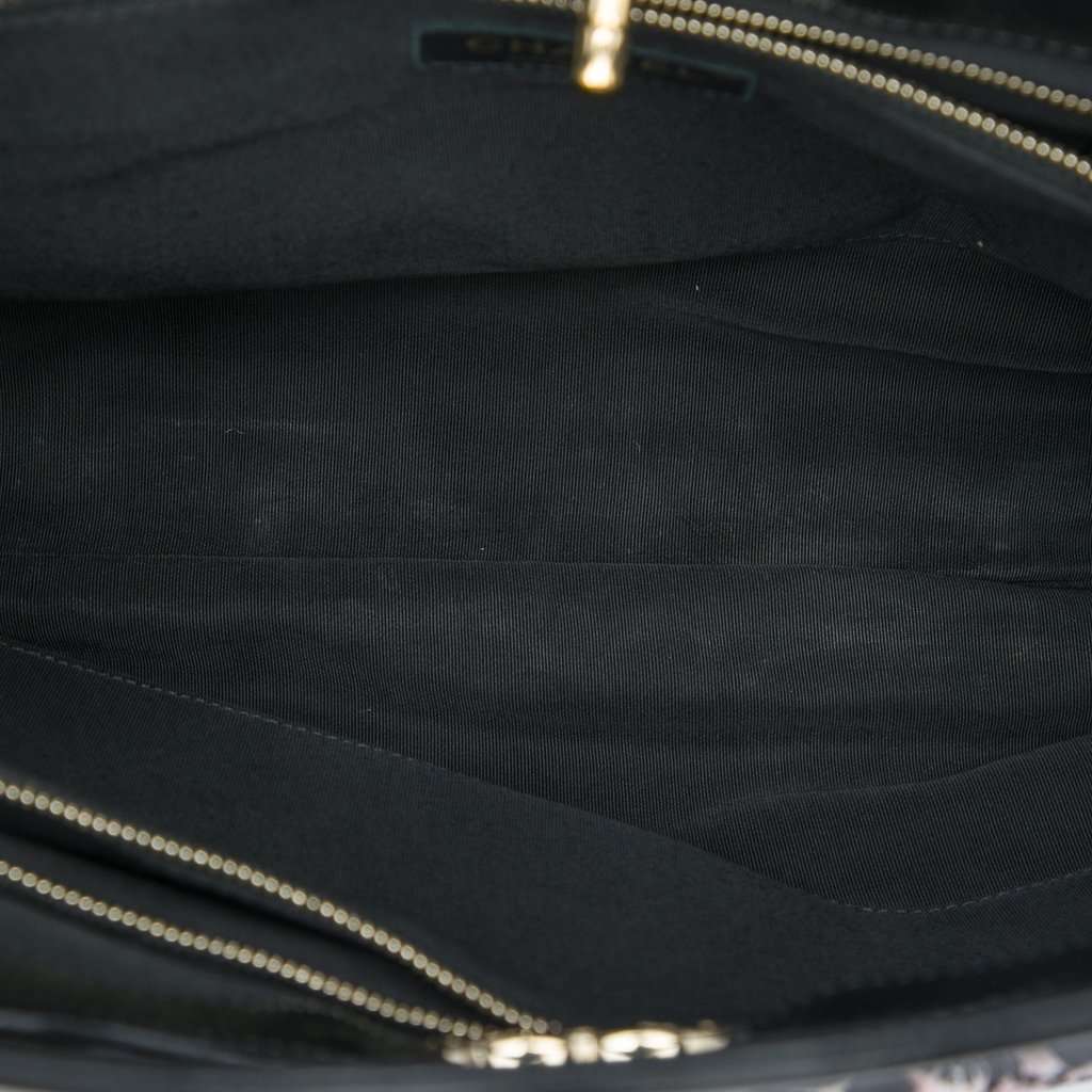 Chanel Large Printed Canvas and Glazed Calfskin 31 Shopping Bag Black Very good - Model View