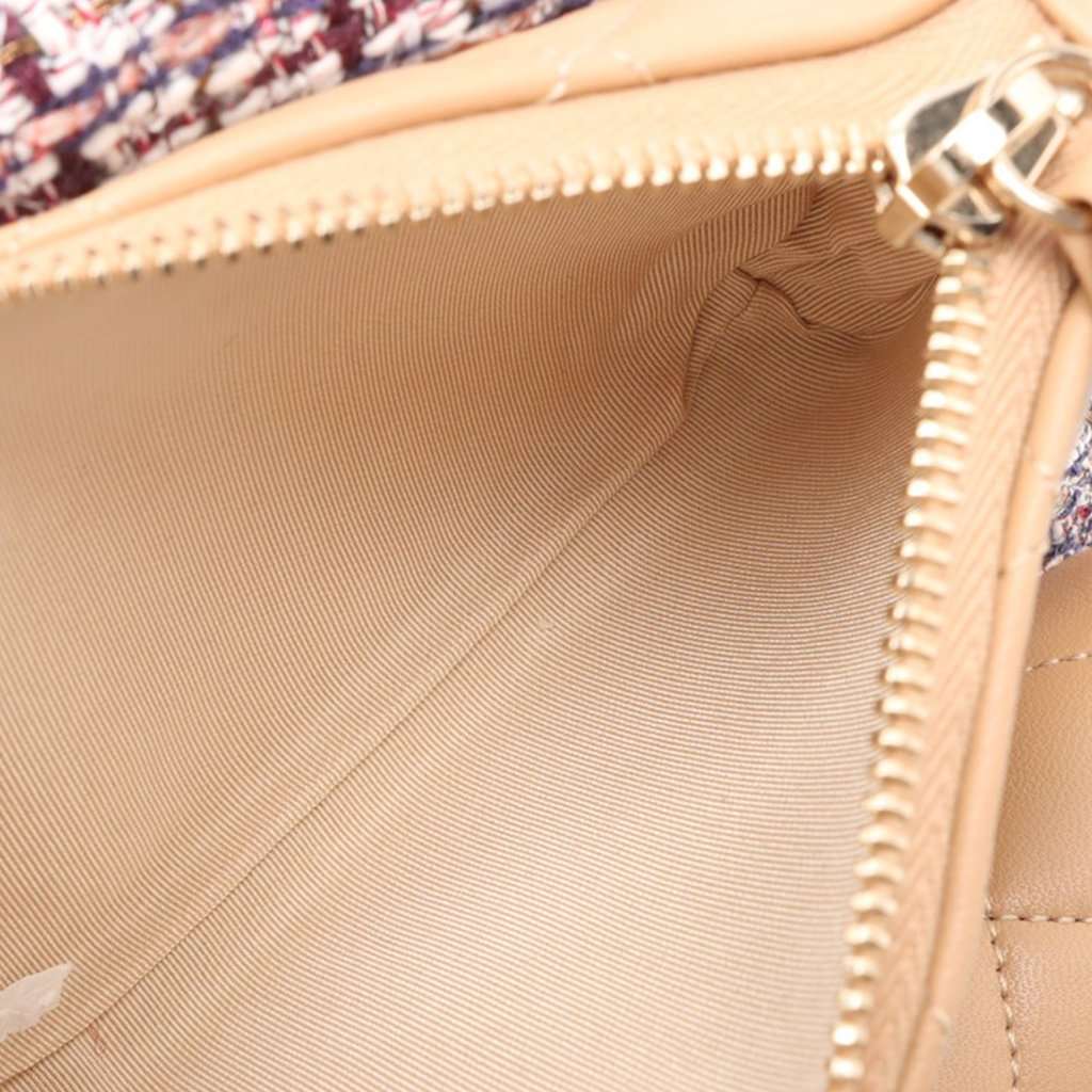 Chanel Tweed and Quilted Lambskin Multi Pocket Drawstring Backpack Beige Very good condition - Model View