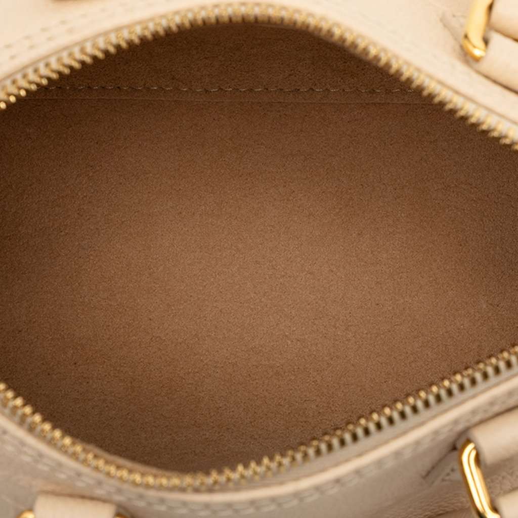 Louis Vuitton Monogram Empreinte Giant Papillon BB Beige Leather Very good condition - Model View