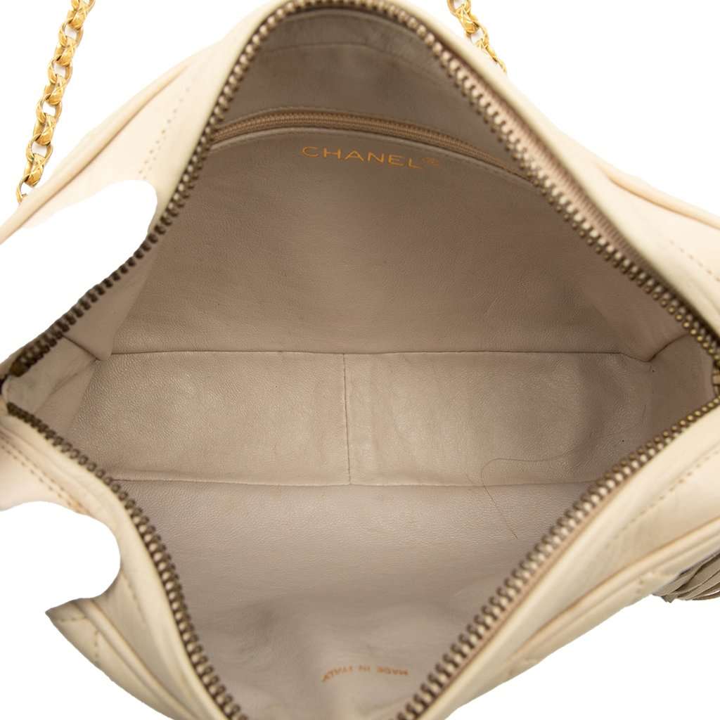 Chanel CC Quilted Lambskin Tassel Crossbody Bag Beige Leather Good condition - Model View