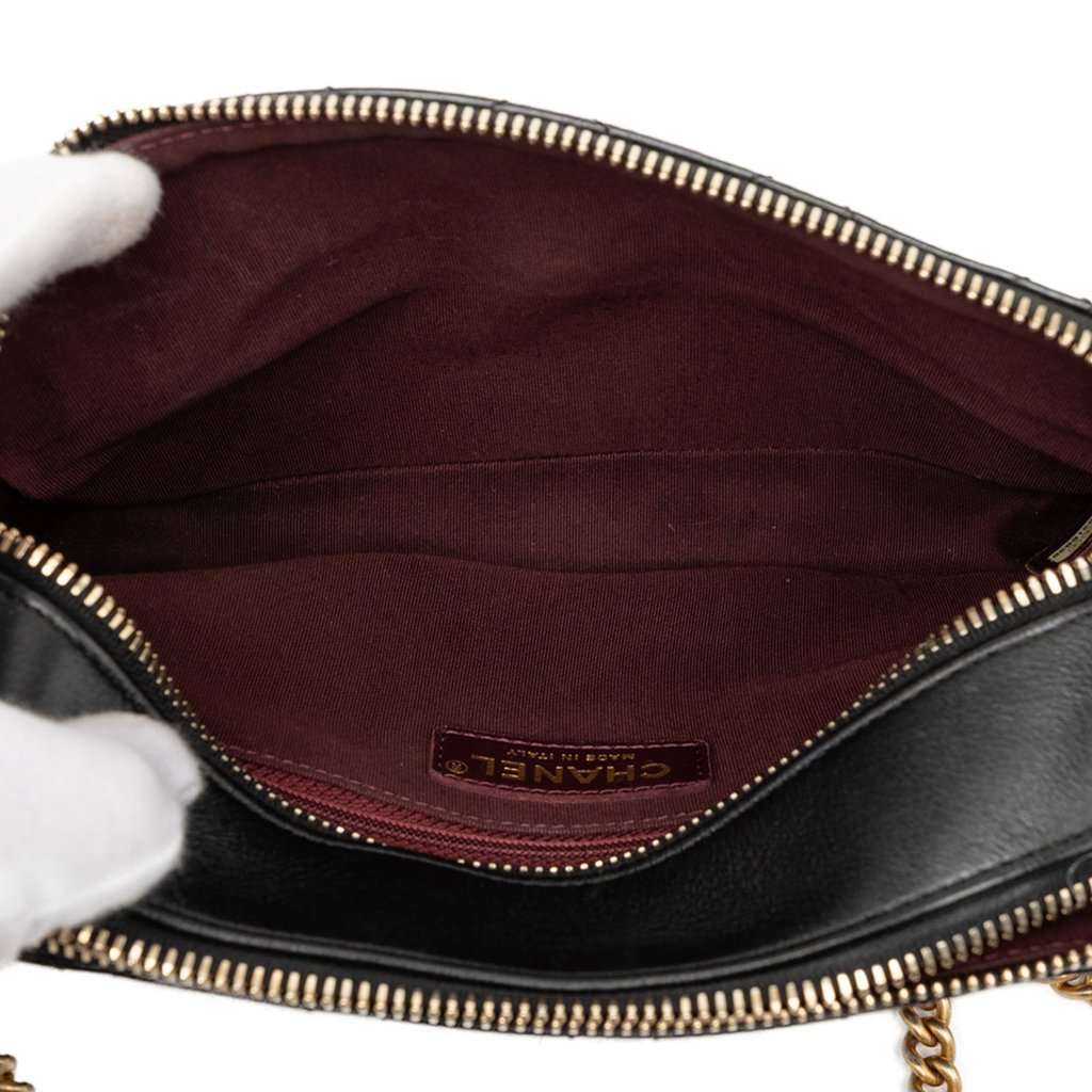 Chanel Calfskin Grosgrain Stitched Button Up Camera Case Black Leather Very good condition - Model View