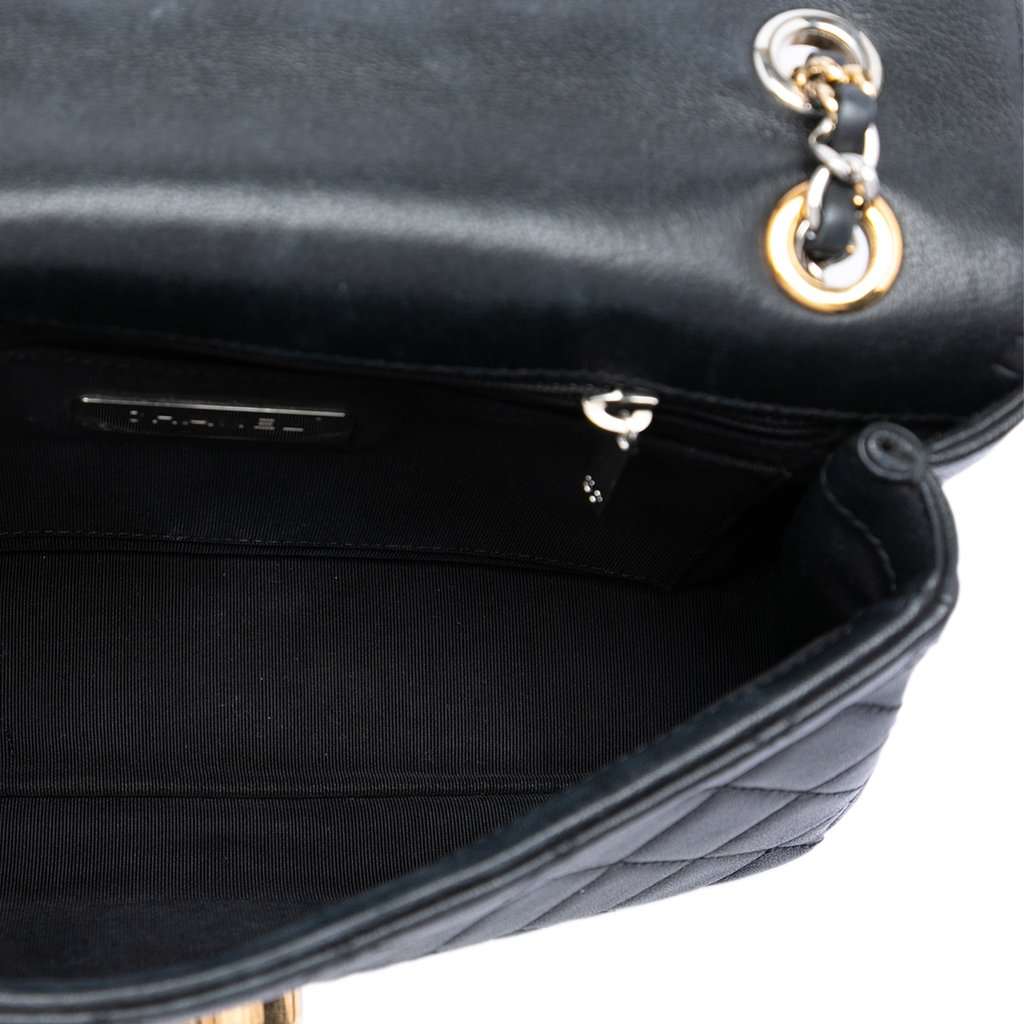 Chanel Quilted Lambskin Turn and Lock Flap Black Leather Very good condition - Model View