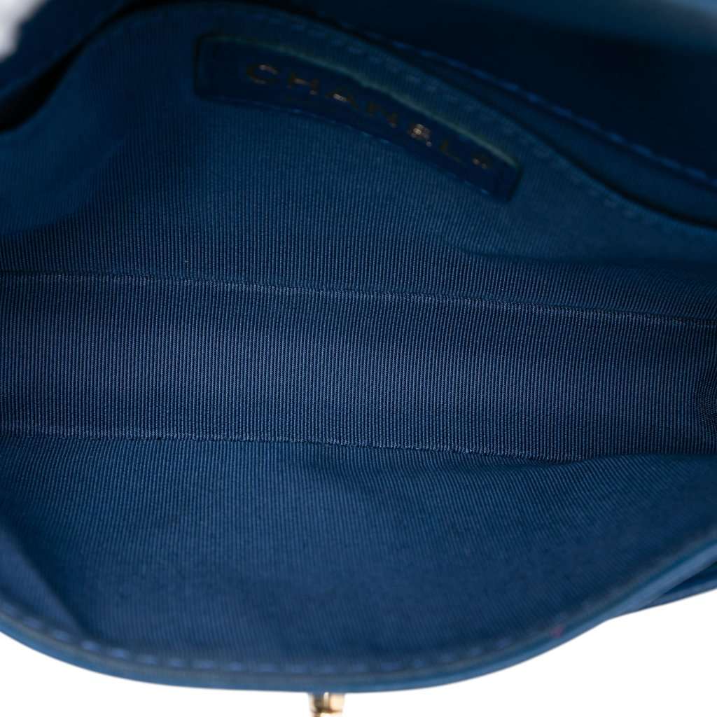 Chanel Mini Quilted Goatskin Coco Curve Flap Blue Leather Never worn, with tag - Model View