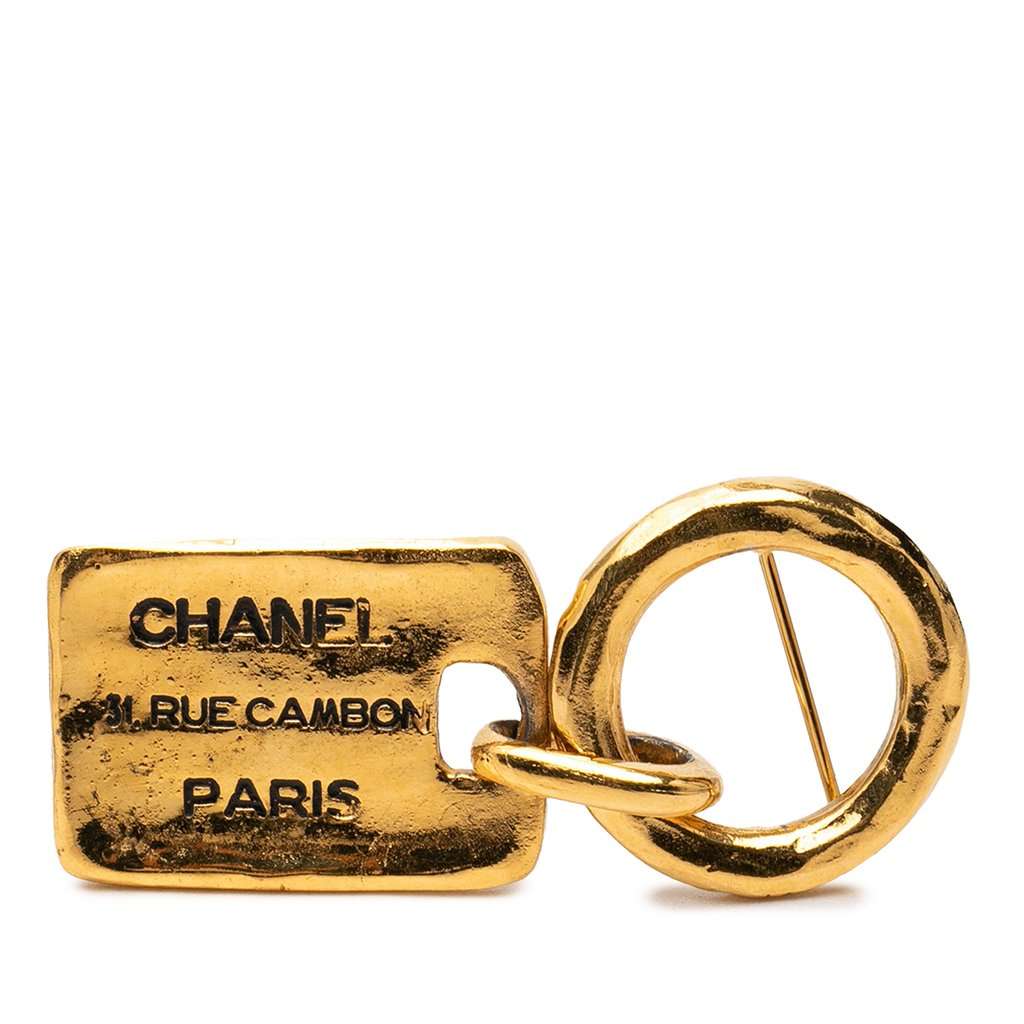 Chanel Gold Plated Rue Cambon Tag Brooch Gold Metal Very good - Front View