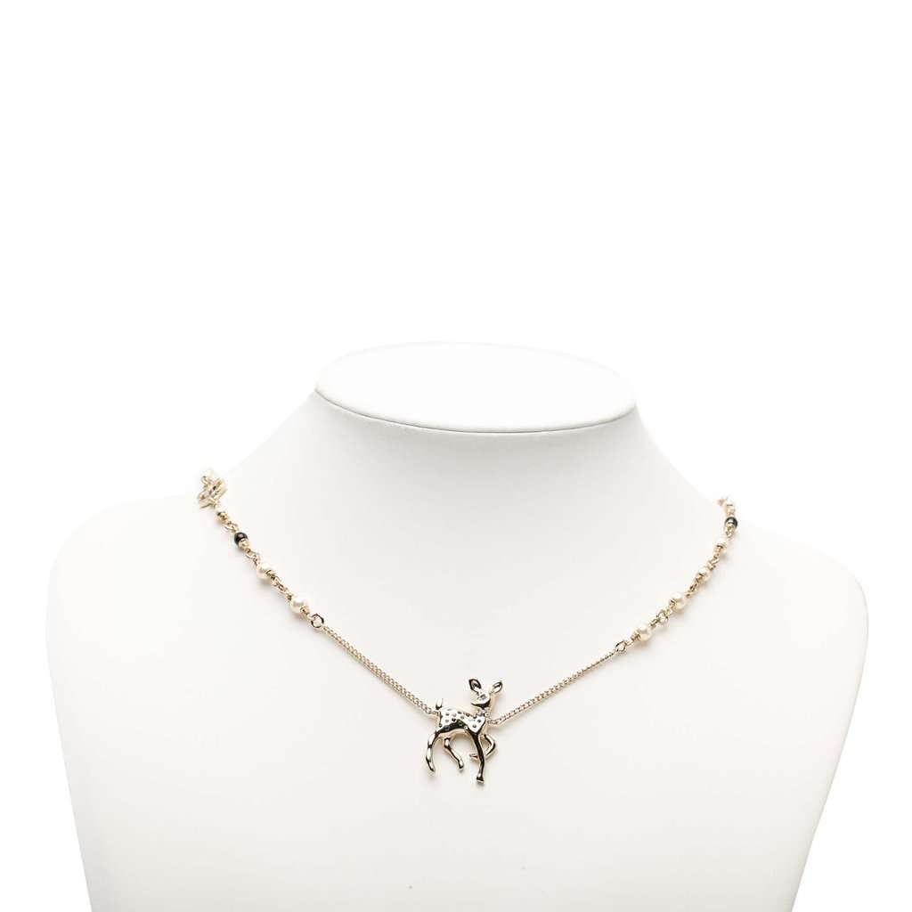 Chanel CC Gold Plated Faux Pearl and Strass Deer Pendant Necklace Gold Metal Very good condition - Box View