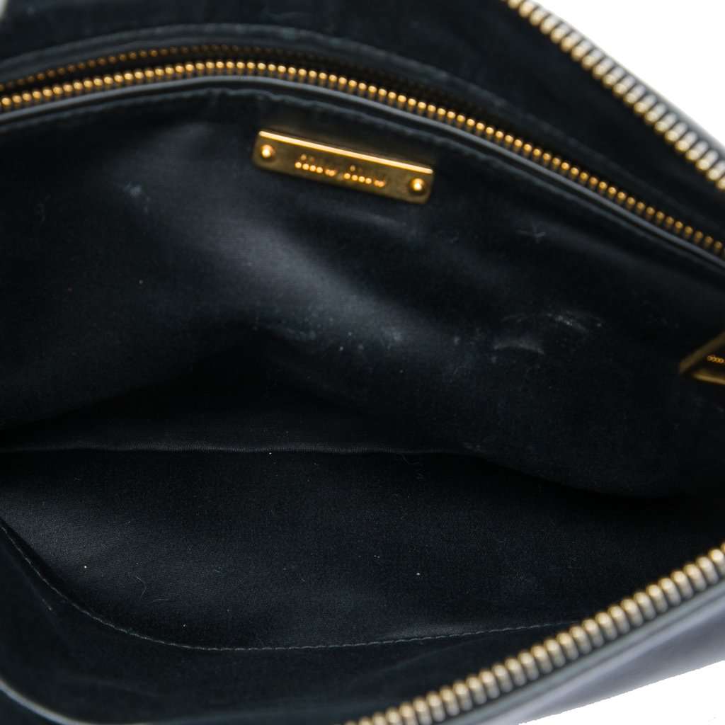 Miu Miu Studded Leather Zip Clutch Black Leather Very good - Model View