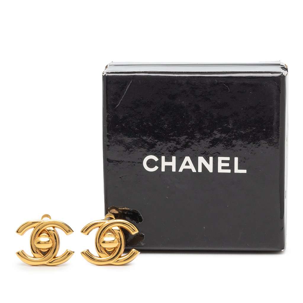 Chanel CC Gold Plated Turn Lock Clip On Earrings Gold Metal Very good - Model View