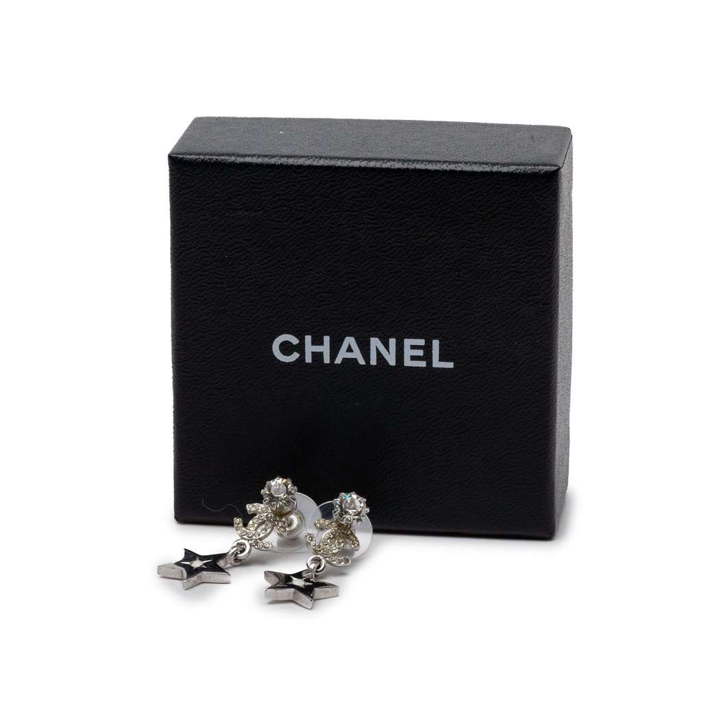 Chanel CC Brass and Strass Star Drop Push Back Earrings Silver Metal Very good condition - Model View
