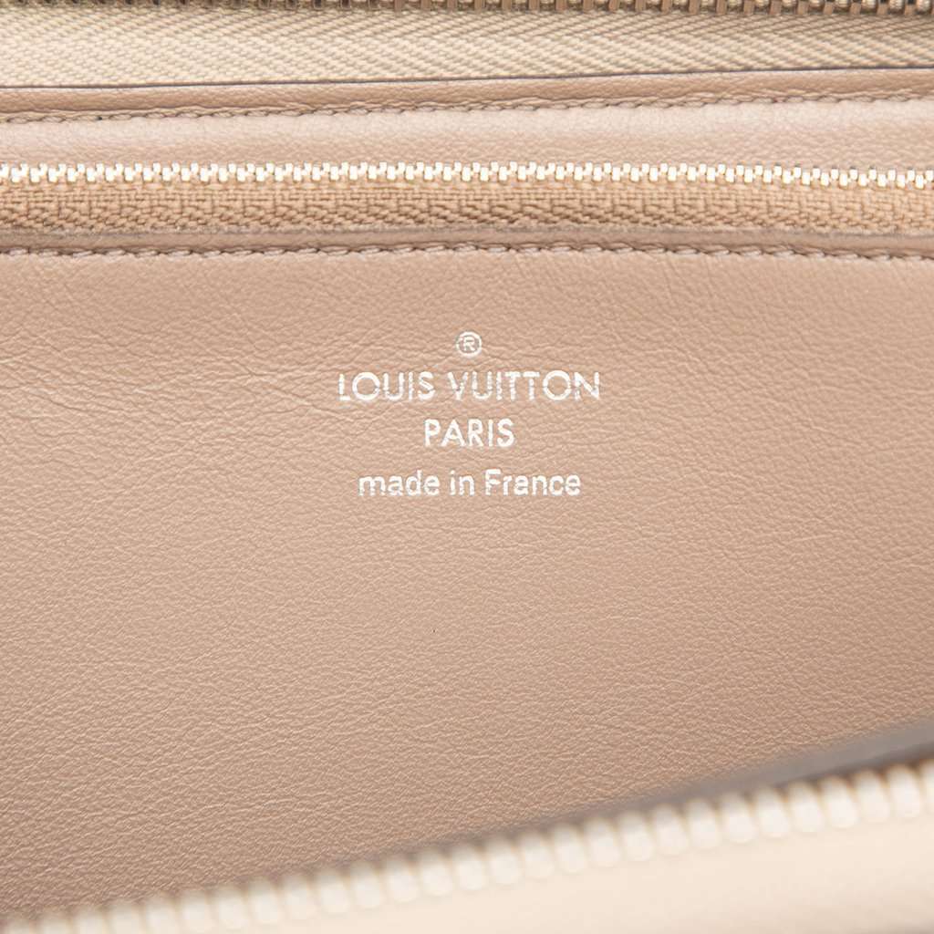 Louis Vuitton Taurillon Comete Wallet Beige Leather Very good condition - Box View