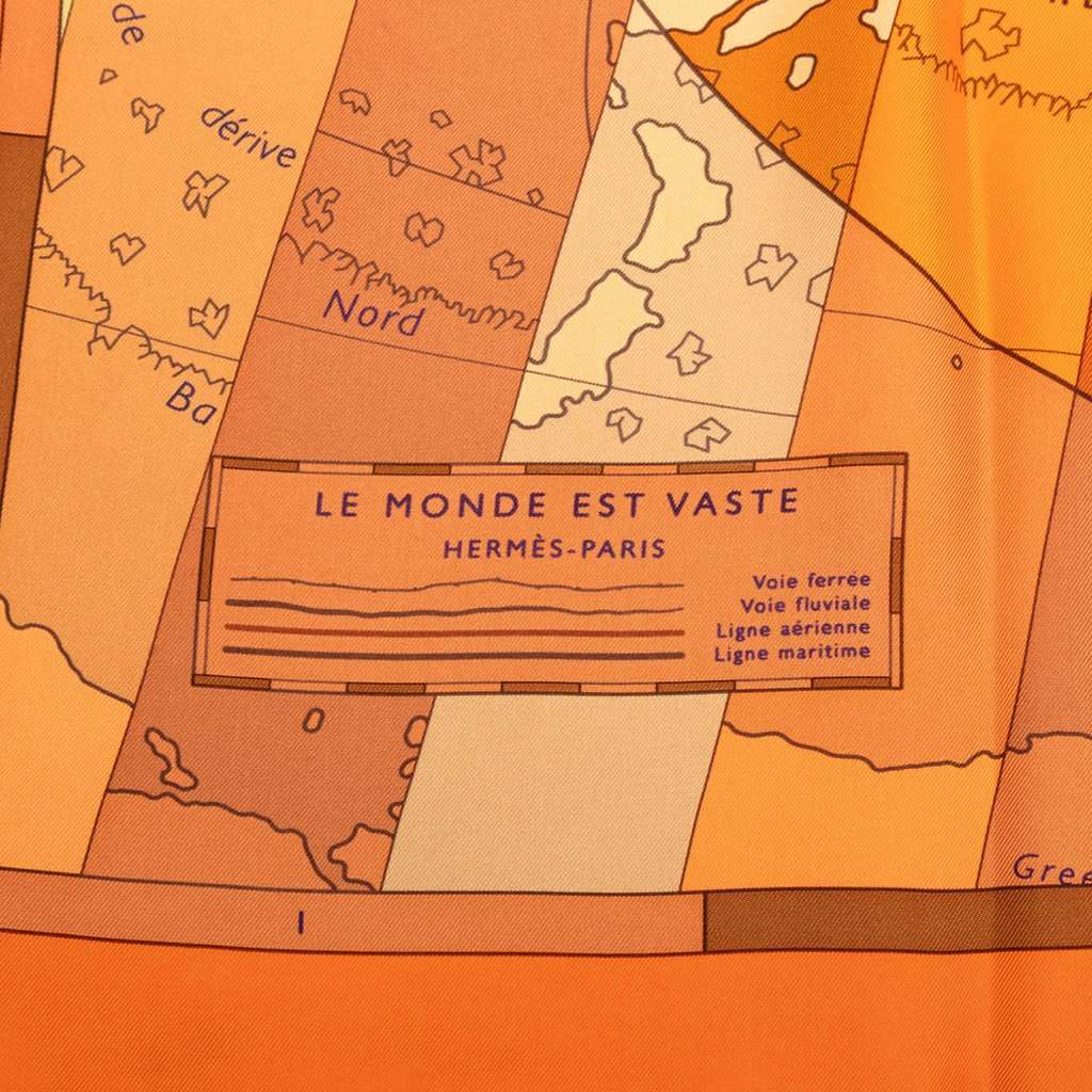Hermès Le Monde Est Vaste Silk Scarf 90 Orange Very good condition - Model View