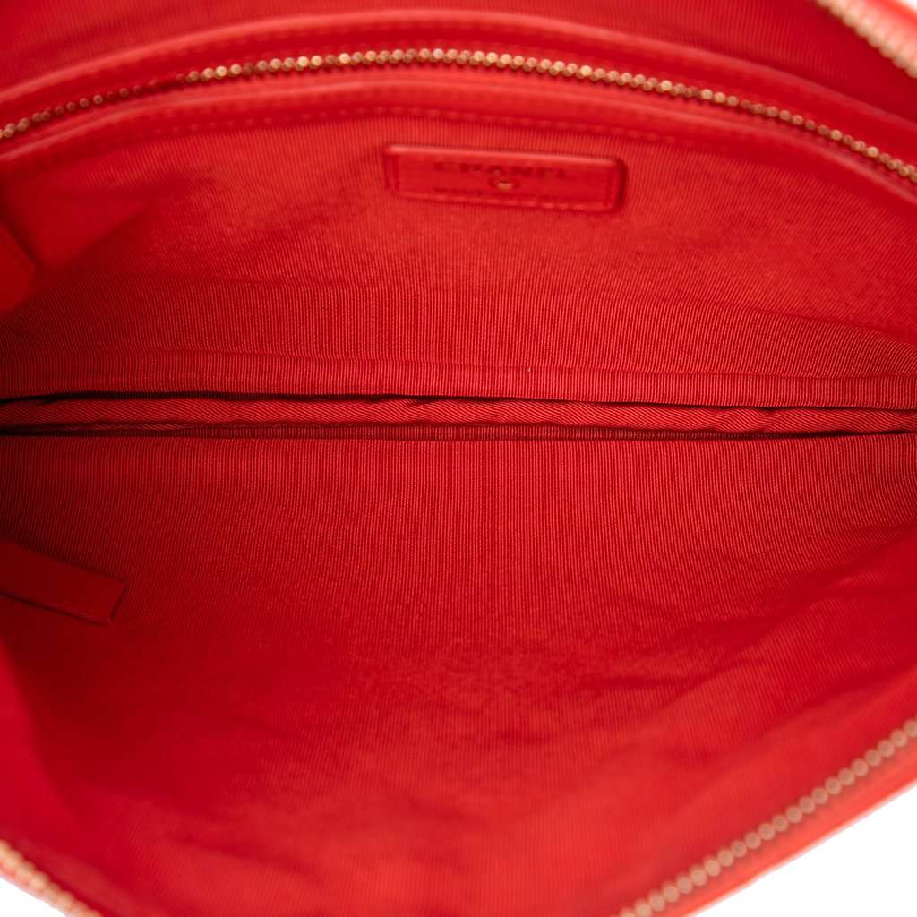 Chanel Medium Quilted Lambskin O Case Clutch Orange Leather Very good - Model View