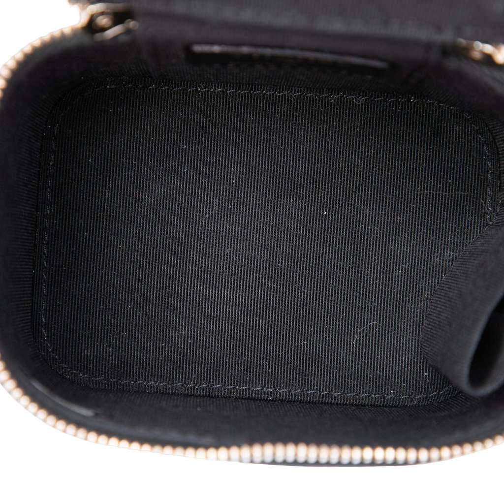 Chanel Mini Camellia Embossed Lambskin Vanity Case With Chain Black Leather Very good - Model View