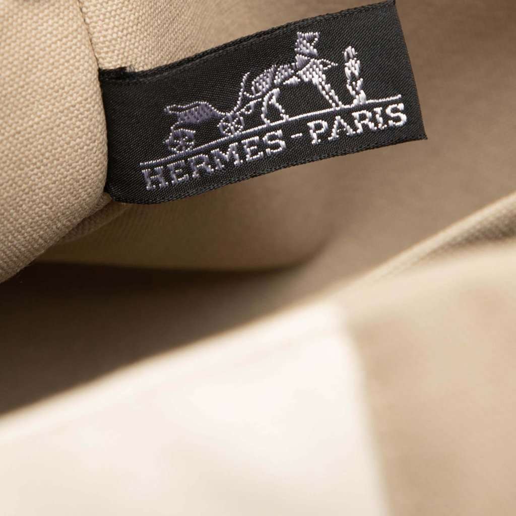 Hermès Bicolor Canvas Tapis de Selle Clutch Brown Very good condition - Box View