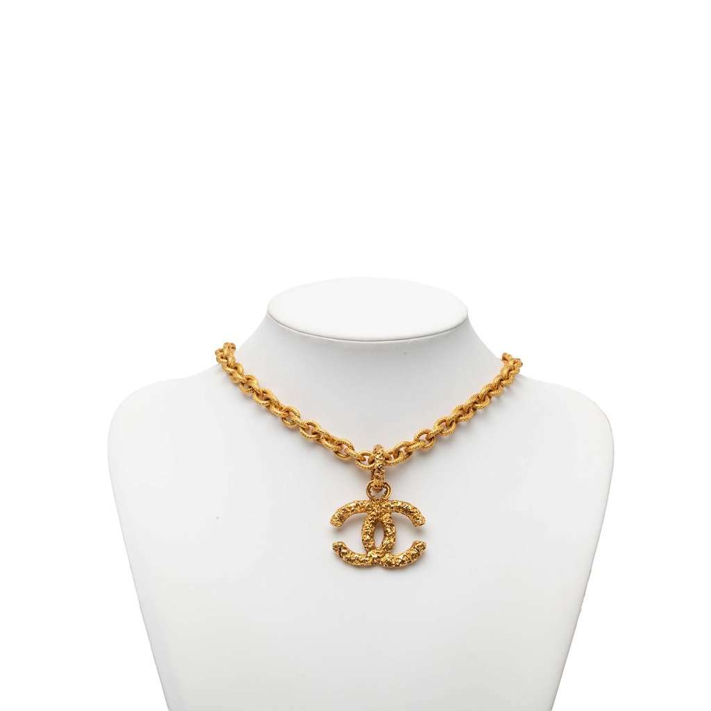 Chanel CC Gold Plated Lava Pendant Necklace Gold Metal Very good condition - Box View