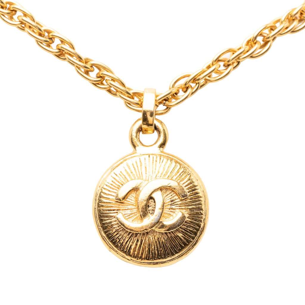 Chanel CC Gold Plated Sunburst Round Pendant Necklace Gold Metal Very good condition - Back View