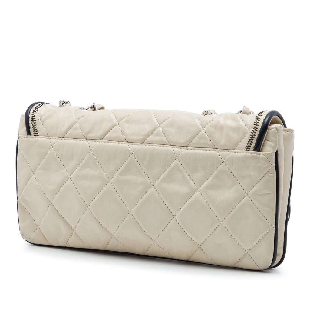 Chanel Quilted Aged Lambskin Reissue 2.55 East West Flap White Leather Very good condition - Back View