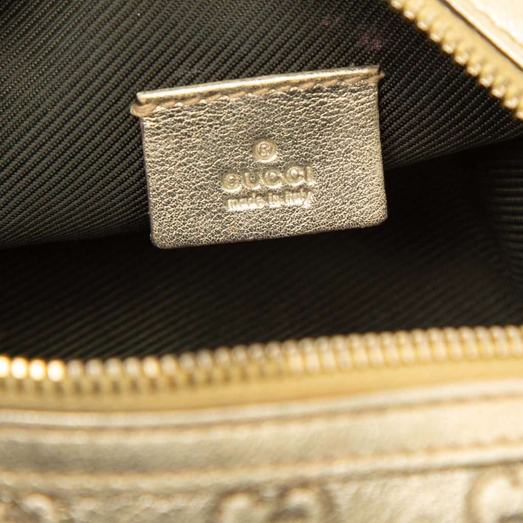 Gucci Metallic Guccissima Cosmetic Pouch Gold Leather Very good condition - Box View