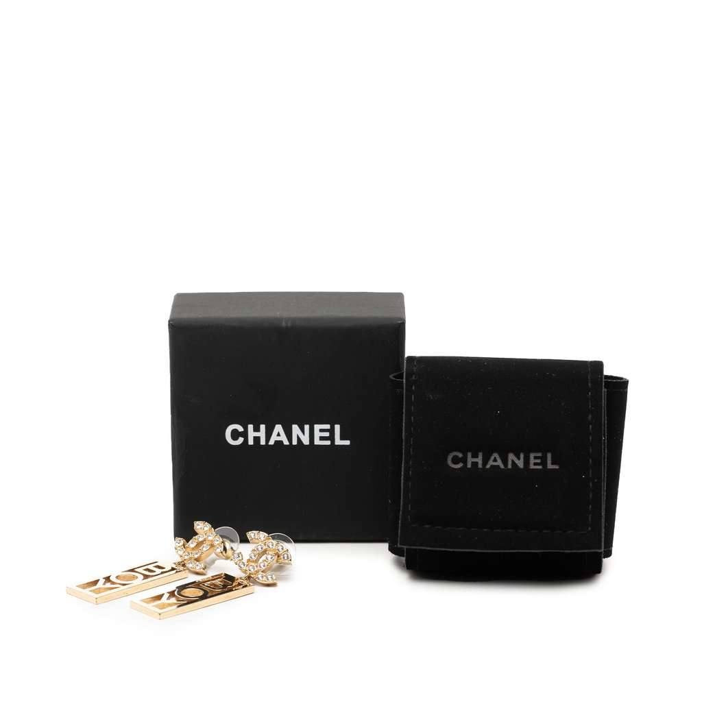 Chanel CC Brass Strass Boy Swing Push Back Earrings Gold Metal Very good - Model View