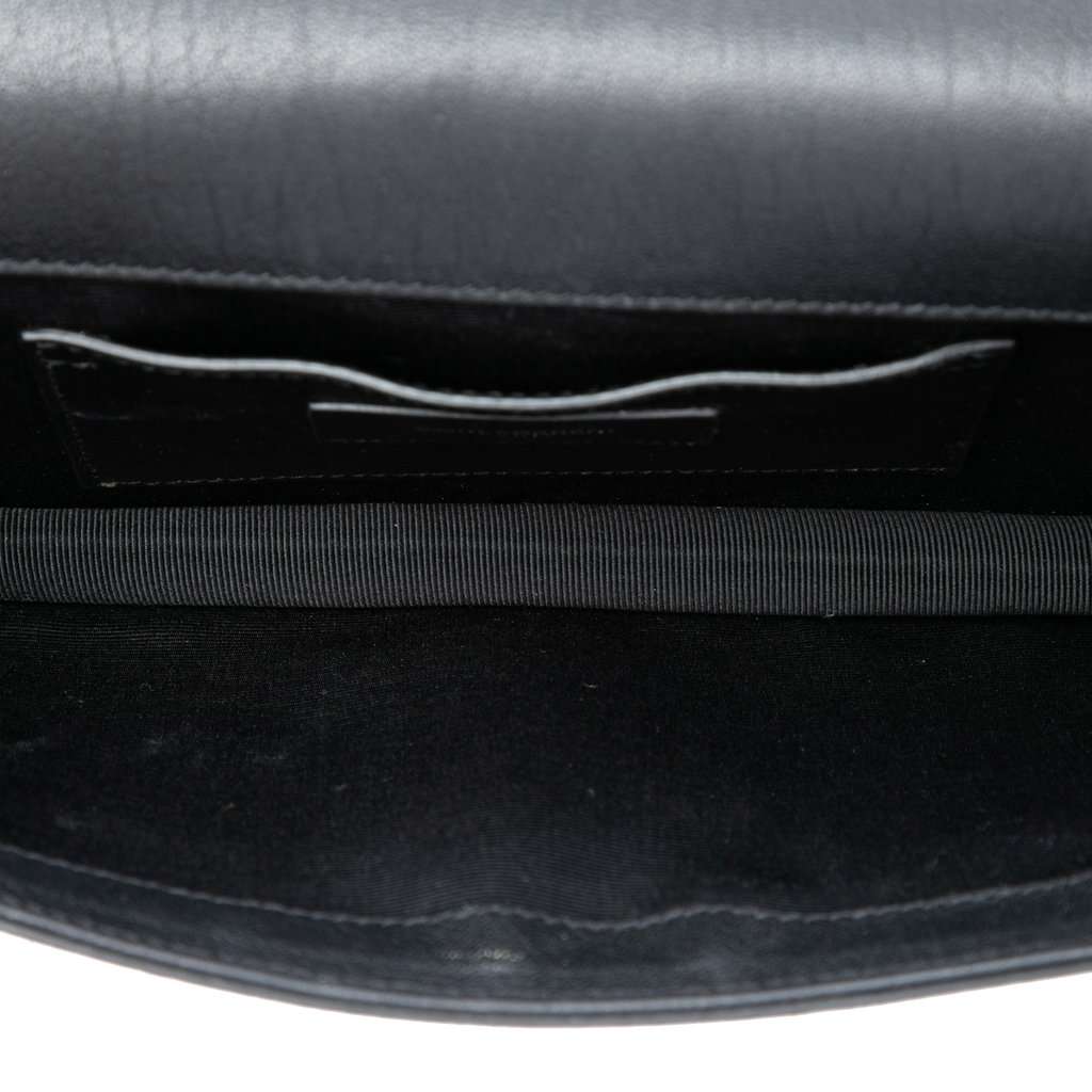 Saint Laurent Studded Leather Monogram Clutch Black Leather Very good - Model View