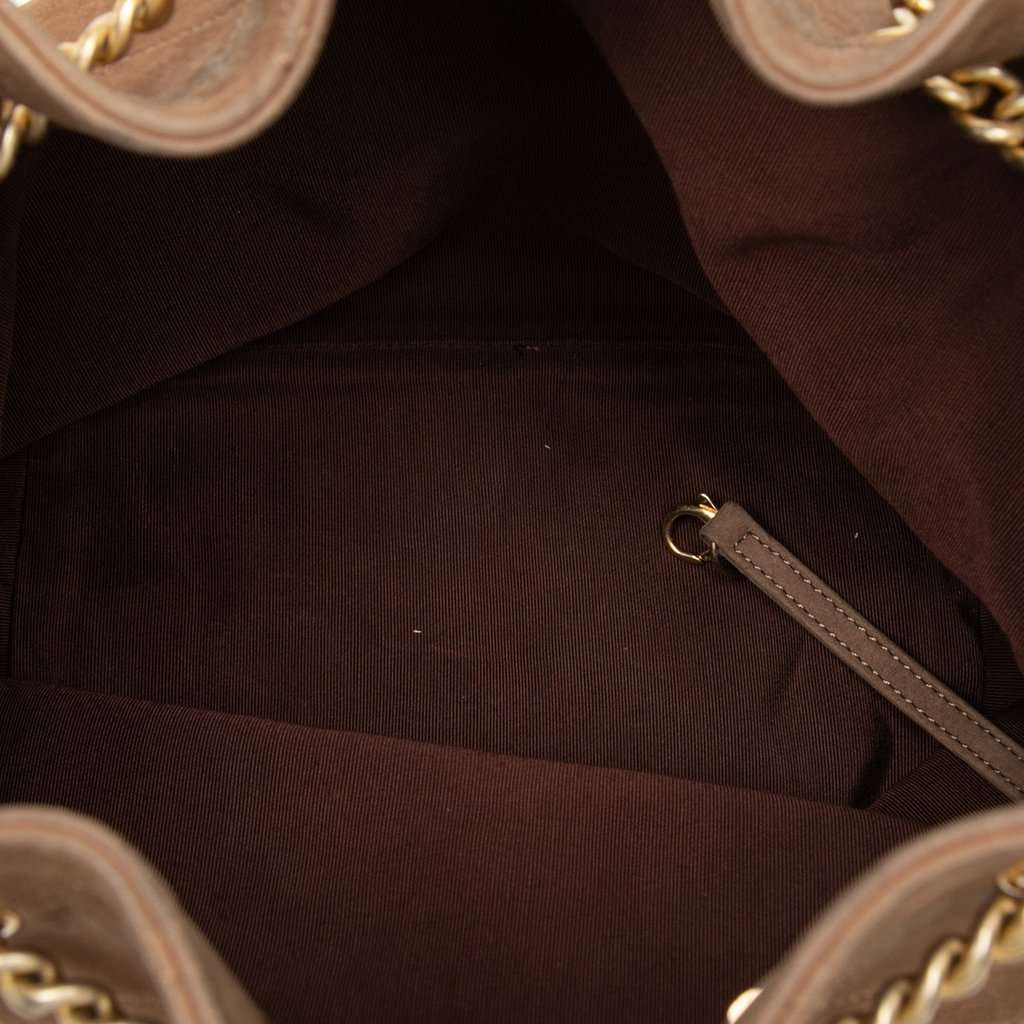 Chanel Small CC Quilted Suede On My Shoulder Drawstring Bucket Bag Brown Leather Very good condition - Model View