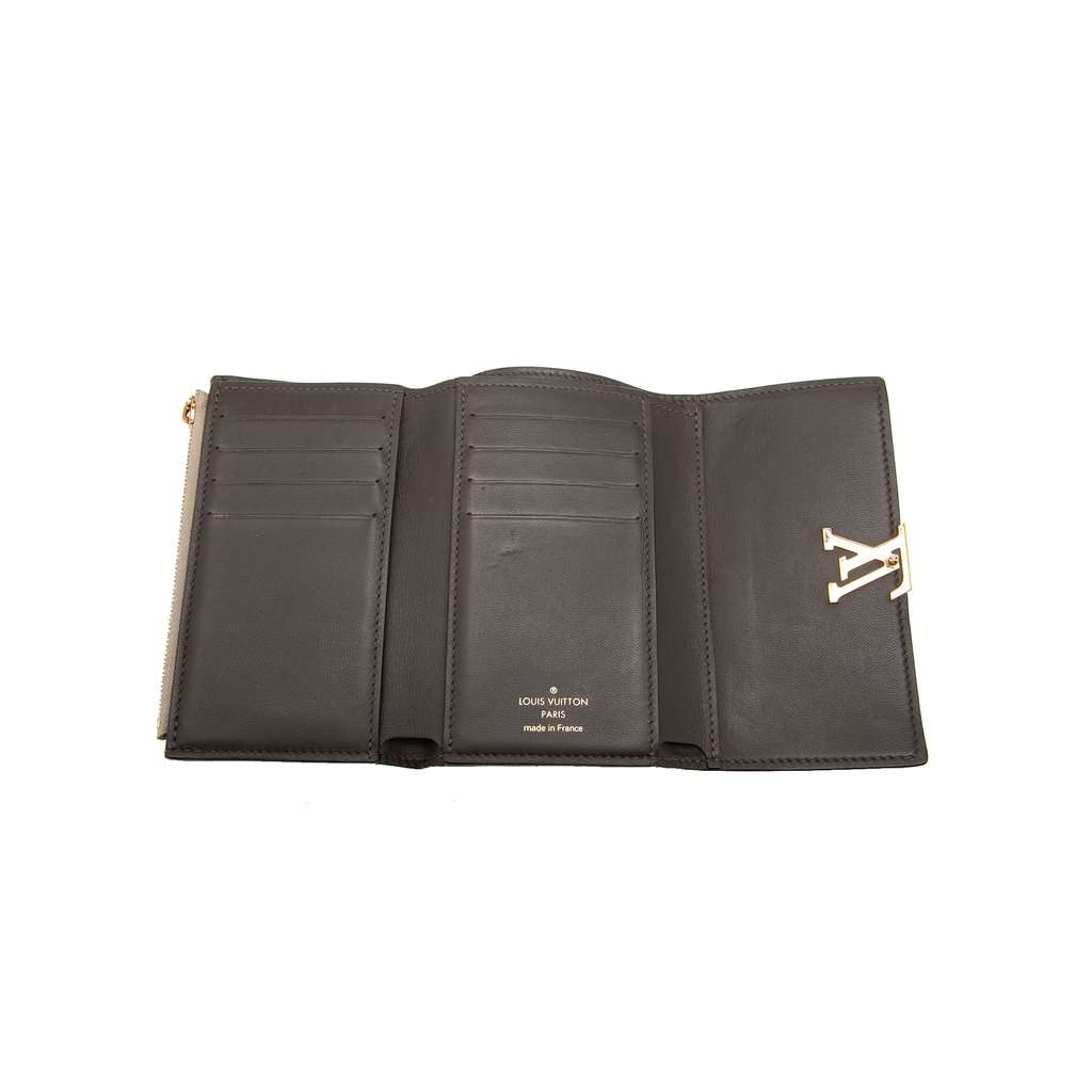 Louis Vuitton Taurillon Capucines Compact Wallet Beige Leather Very good - Model View